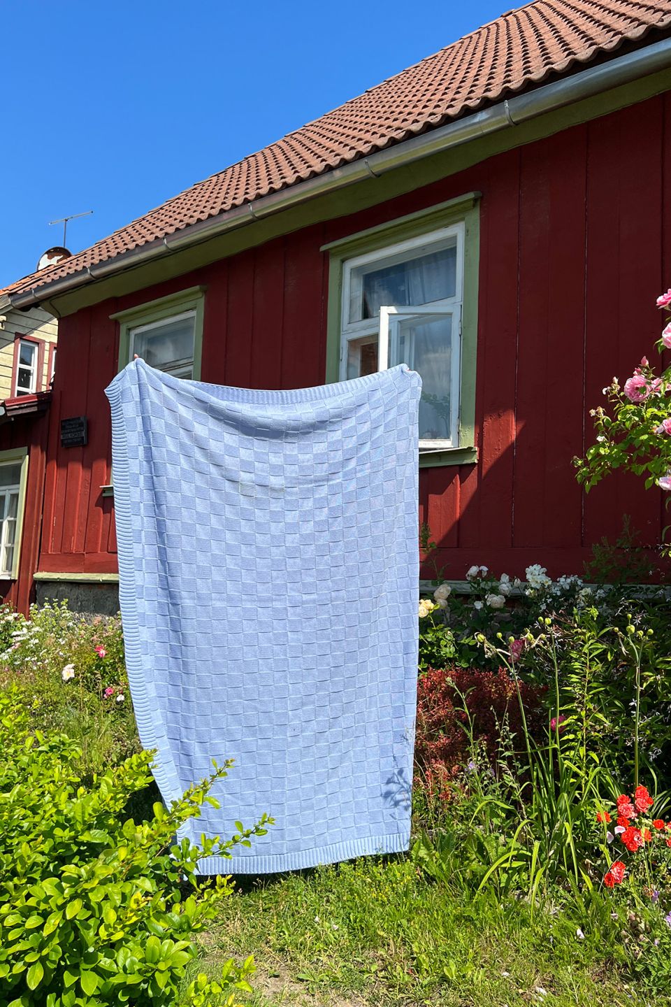 Square merino throw light blue